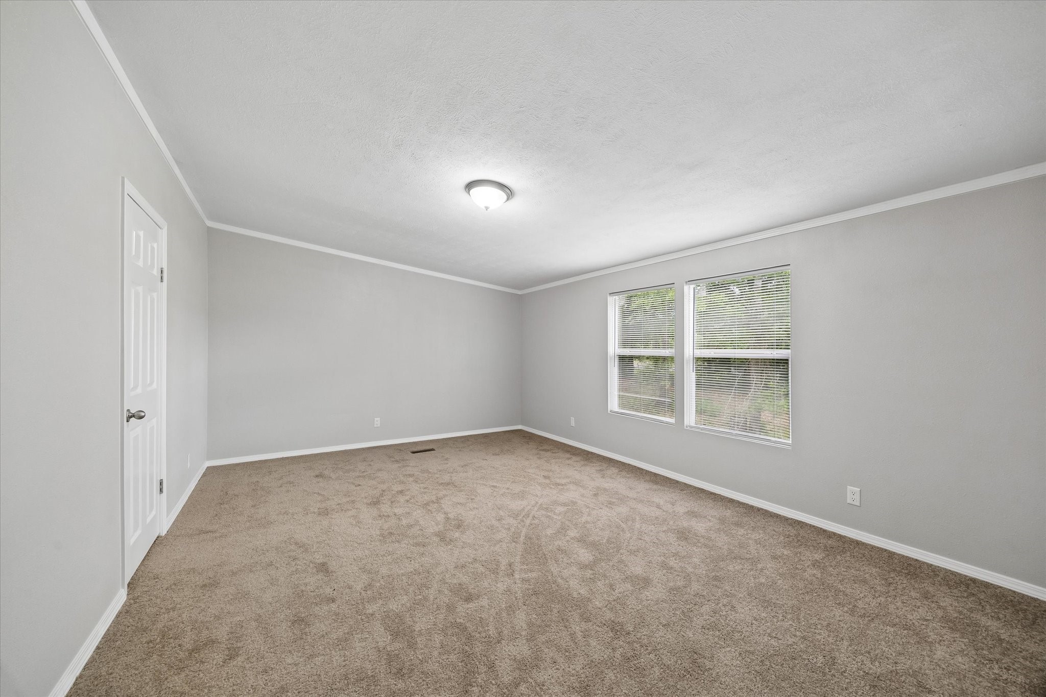 30 Timm Cleveland, TX 77327 - Photo 5 of 10 an empty room with a window