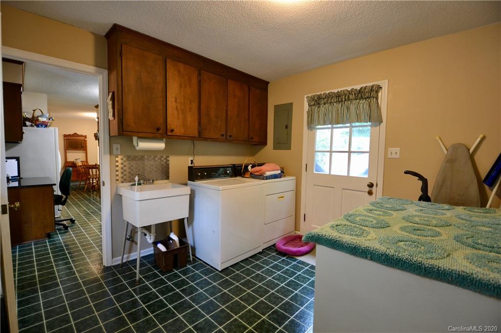 301 Sycamore Road Salisbury, NC 28147 - Photo 22 of 40 a living room with washing machine and window