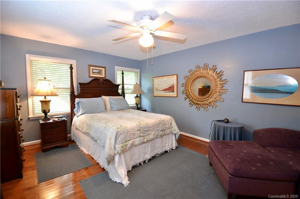 301 Sycamore Road Salisbury, NC 28147 - Photo 23 of 40 a bedroom with a bed and dresser with mirror