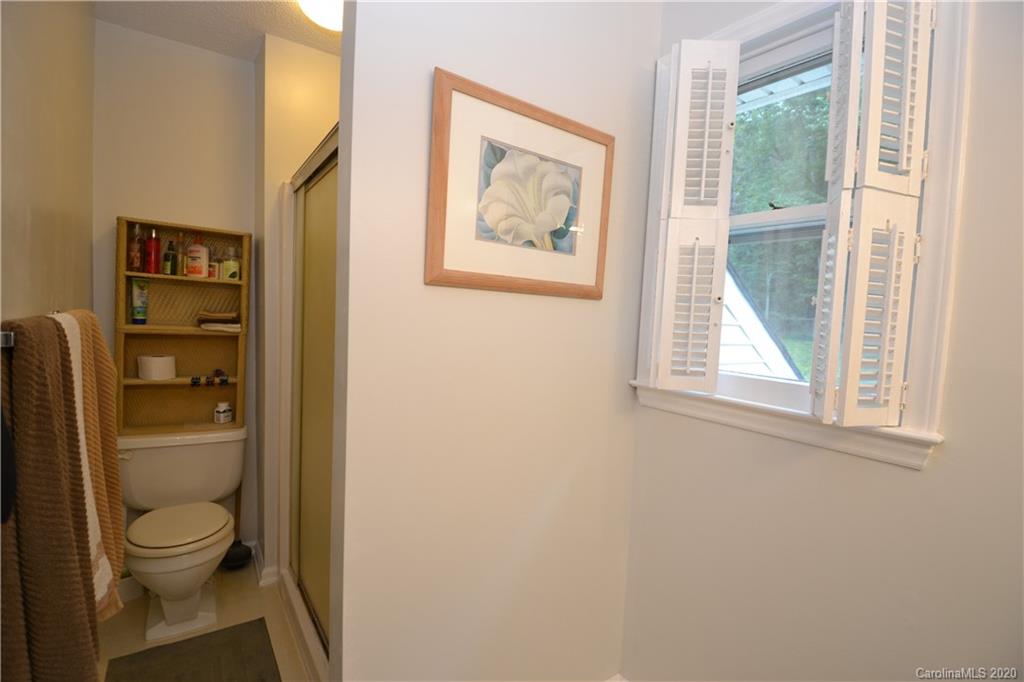 301 Sycamore Road Salisbury, NC 28147 - Photo 26 of 40 a bathroom with a toilet and a shower