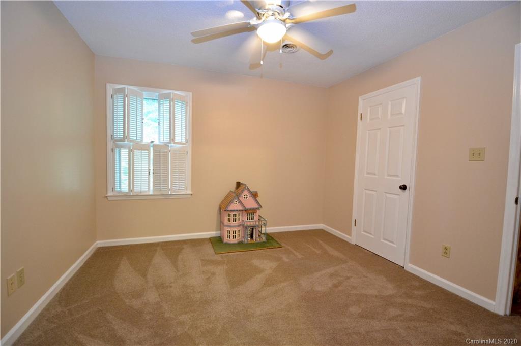 301 Sycamore Road Salisbury, NC 28147 - Photo 28 of 40 wooden floor in an empty room with a window