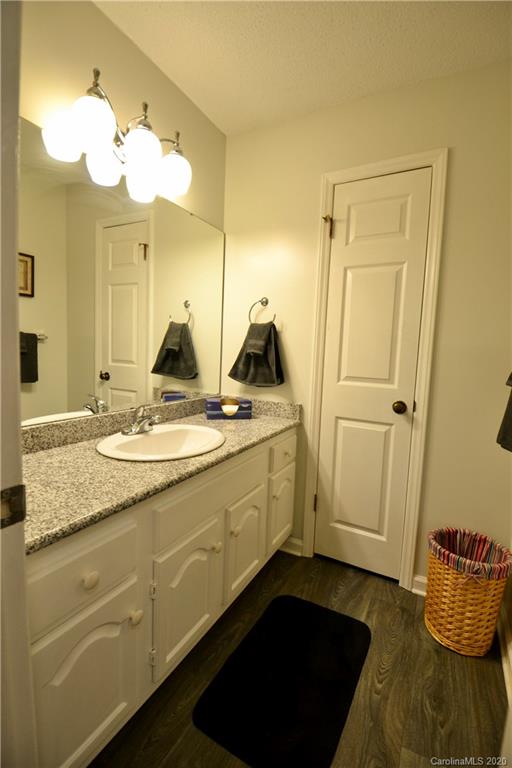 301 Sycamore Road Salisbury, NC 28147 - Photo 31 of 40 a bathroom with a sink and a mirror