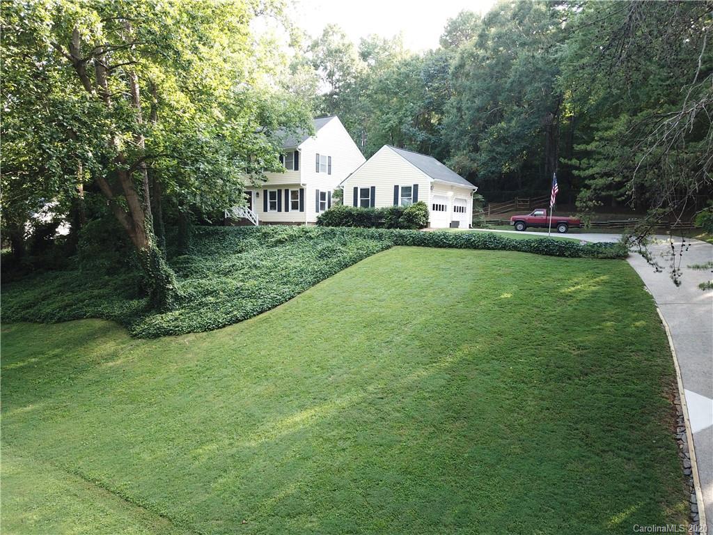301 Sycamore Road Salisbury, NC 28147 - Photo 37 of 40 a view of house with backyard and garden