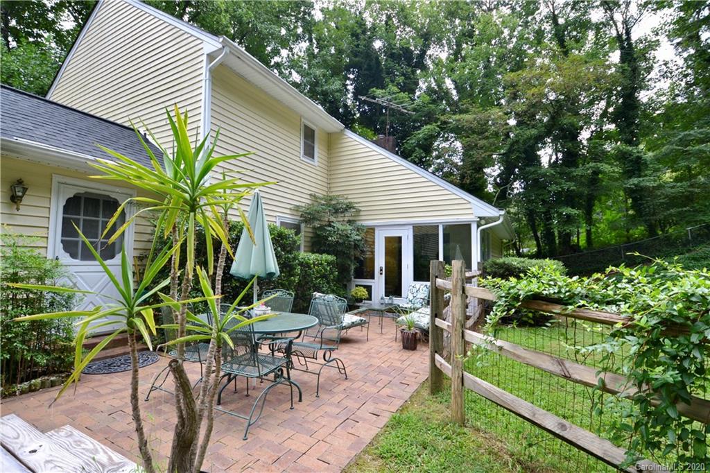 301 Sycamore Road Salisbury, NC 28147 - Photo 5 of 40 a view of backyard with outdoor seating and plants