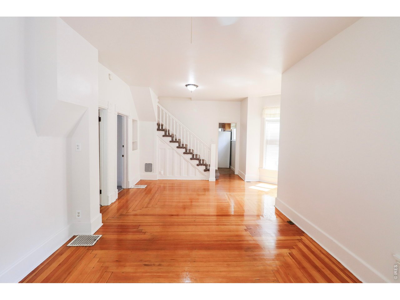 608 South Howes Street Fort Collins, CO 80521 - Photo 5 of 28 a view interior of house with wooden floor