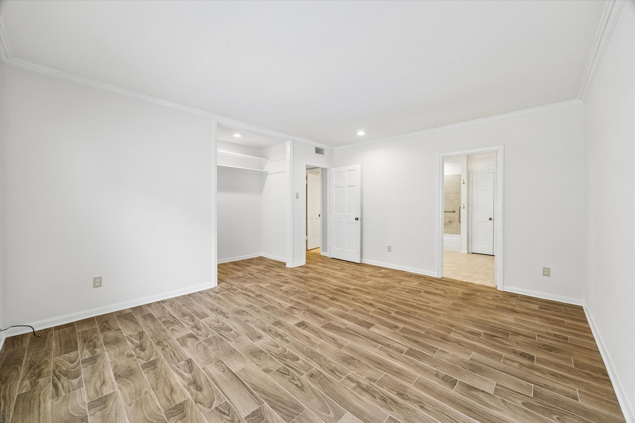 2230 South Piney Point Road, Unit 103 Houston, TX 77063 - Photo 16 of 28 This beautiful and spacious Primary suite has a remarkable versatile nook that can be used for an office space/extra closet or more!