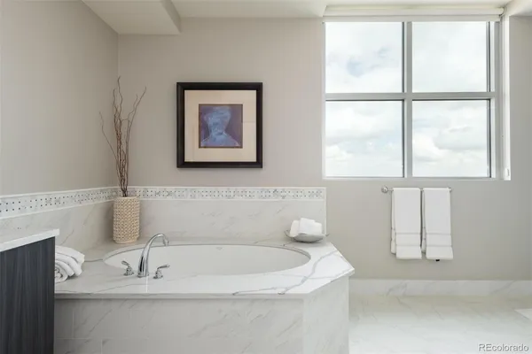 a bathroom with a sink and a bathtub