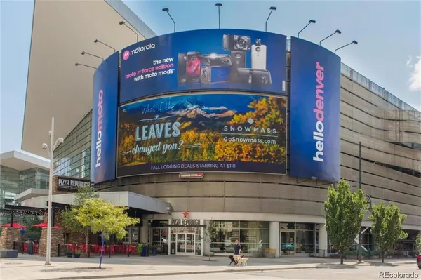 a view of a building with a sign on the wall