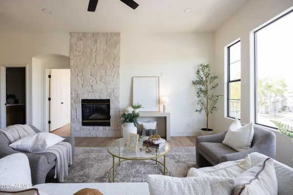 a dining room with furniture and window