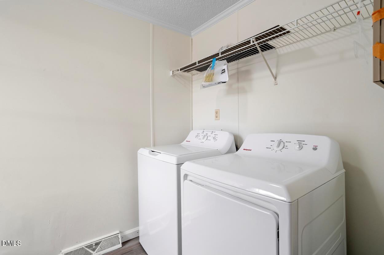 919 Red Mountain Road Rougemont, NC 27572 - Photo 13 of 32 a utility room with dryer and washer