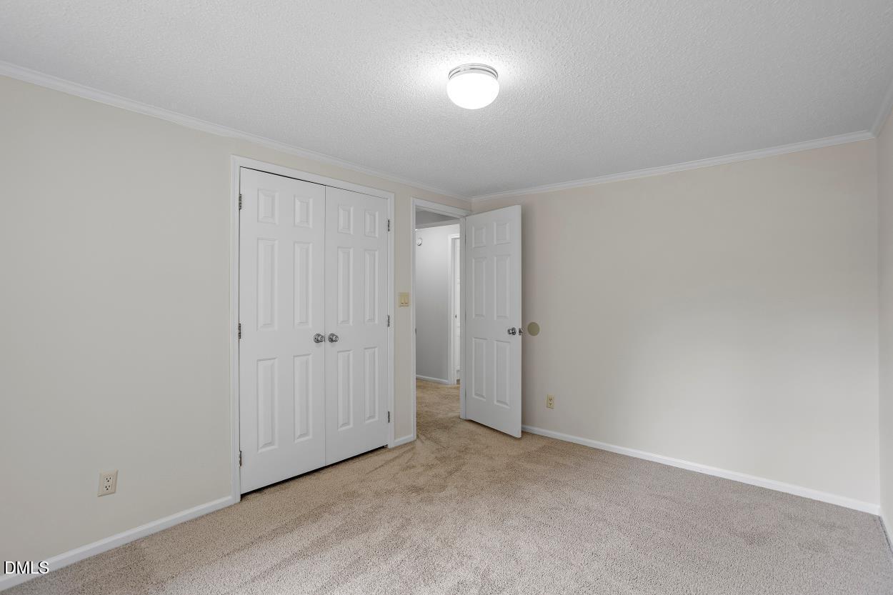 919 Red Mountain Road Rougemont, NC 27572 - Photo 25 of 32 a view of an empty room