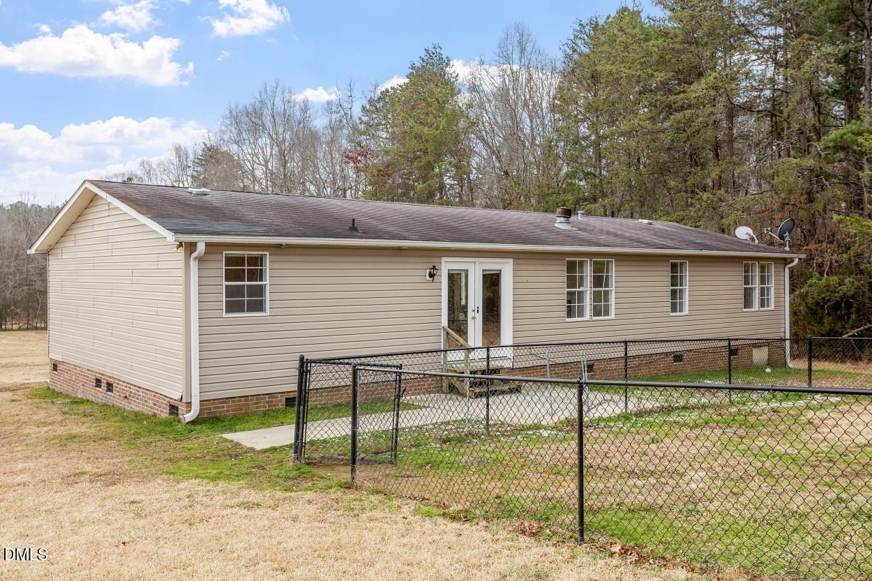 919 Red Mountain Road Rougemont, NC 27572 - Photo 30 of 32 a view of backyard of house
