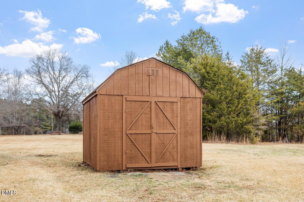 919 Red Mountain Road Rougemont, NC 27572 - Photo 31 of 32 a view of backyard