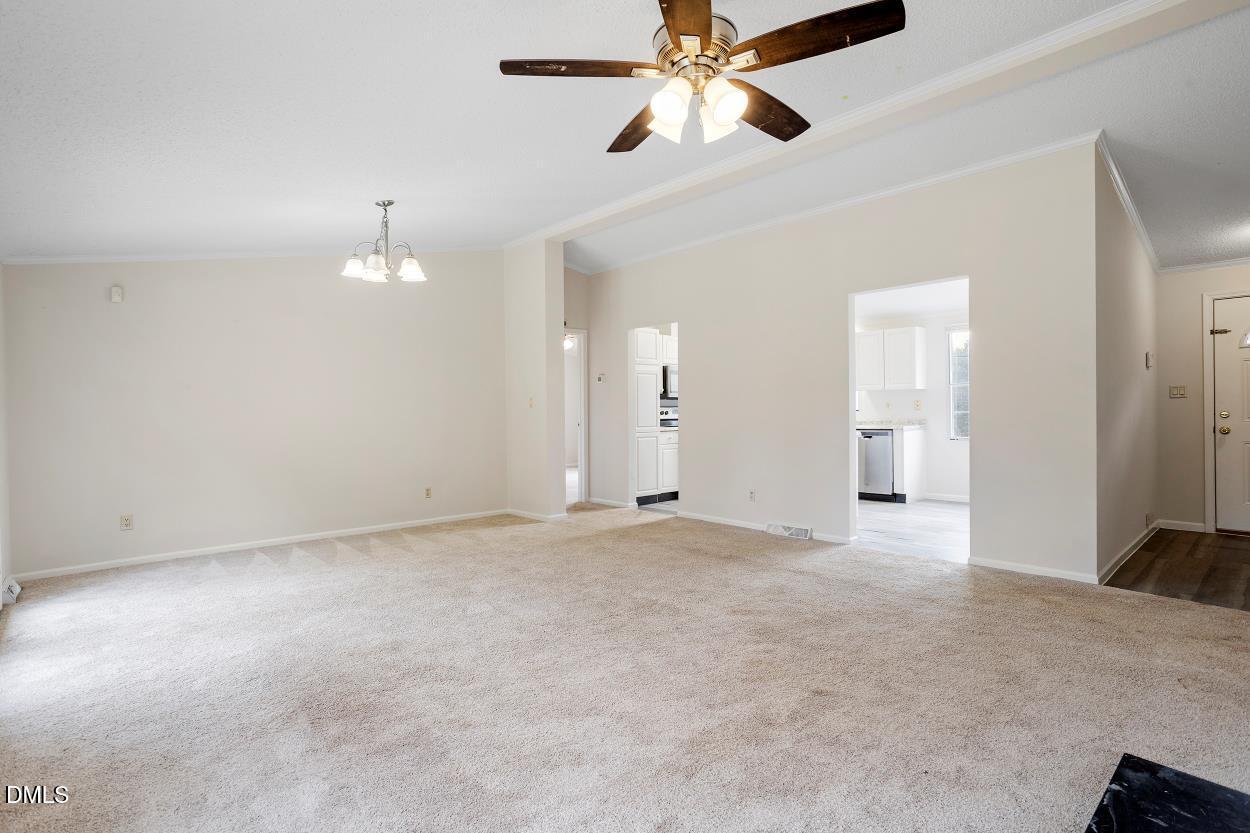 919 Red Mountain Road Rougemont, NC 27572 - Photo 7 of 32 an empty room with fan and entrance