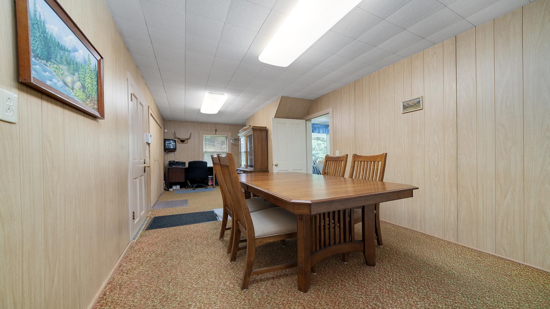 3910 Highway 64 Oregon, IL 61061 - Photo 11 of 53 a view of a dining room with furniture