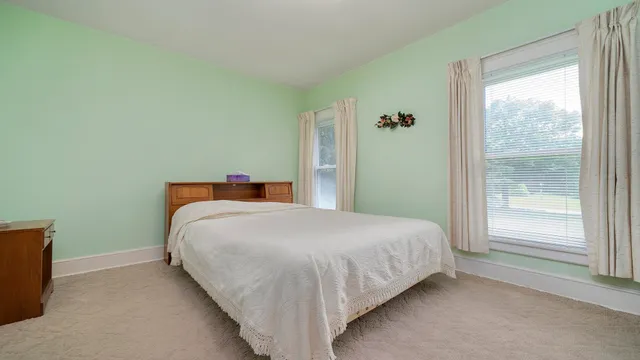 a balcony with seating space