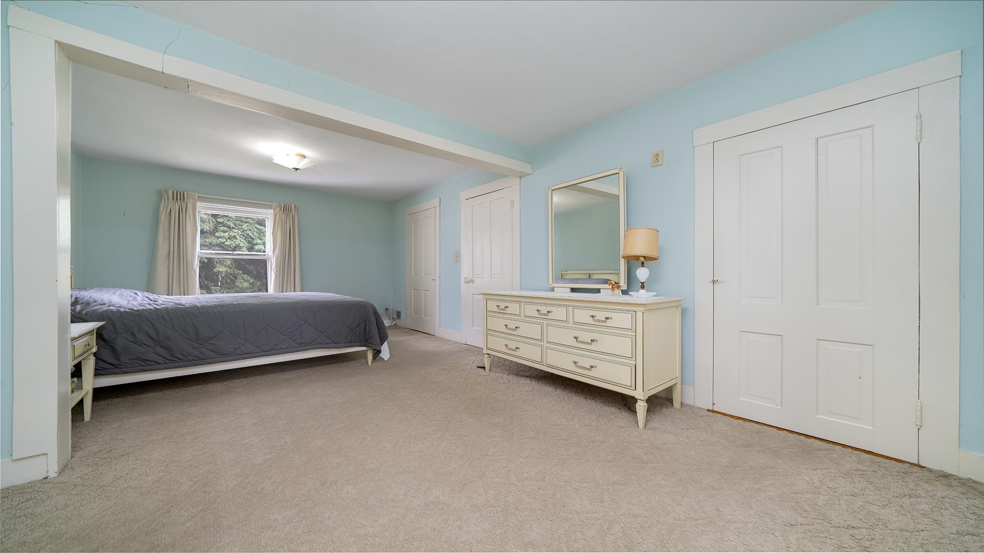 3910 Highway 64 Oregon, IL 61061 - Photo 33 of 53 a bedroom with a bed and a dresser