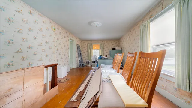 a view of an house with backyard space and garden