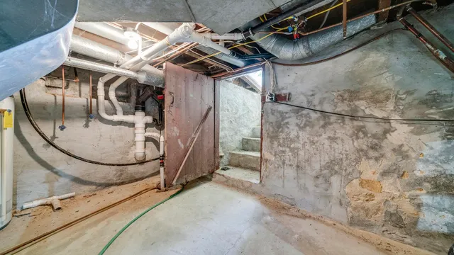 a view of a garage with table and chairs