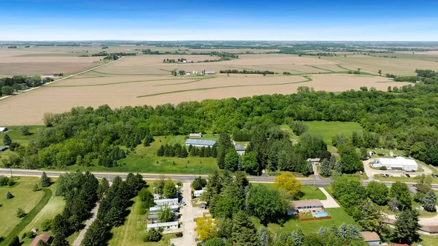 an aerial view of a city and mountain view in back