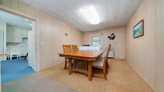 a view of a dining room with furniture