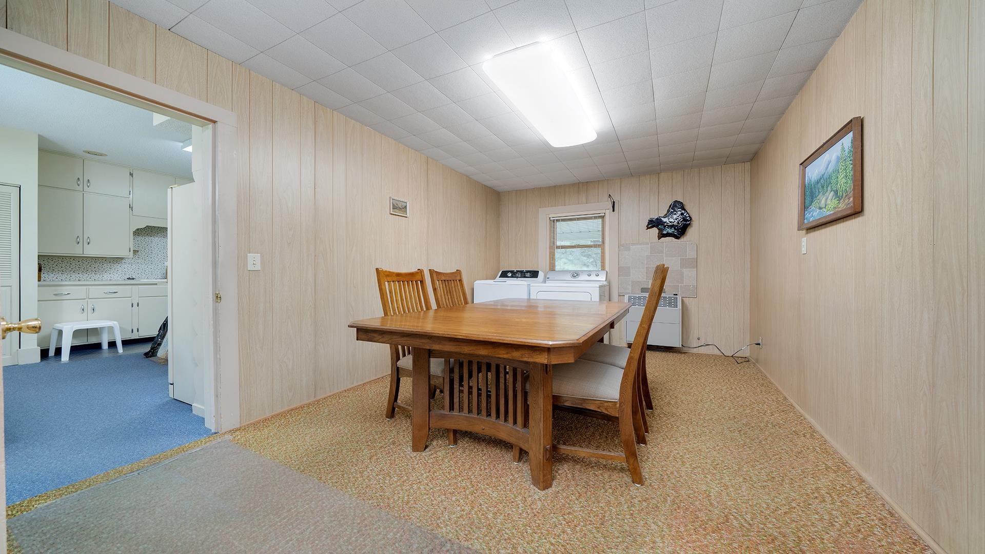 3910 Highway 64 Oregon, IL 61061 - Photo 9 of 53 a view of a dining room with furniture