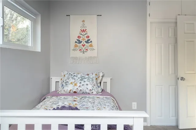 a view of wooden door in the corner