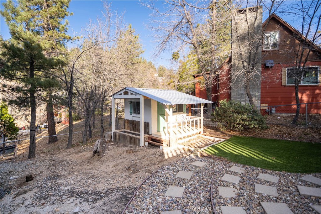 32958 Squirrel Lane Running Springs, CA 92382 - Photo 26 of 40 a view of a house with a yard