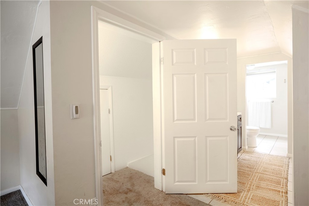 32958 Squirrel Lane Running Springs, CA 92382 - Photo 27 of 40 a view of a bathroom with wooden floor
