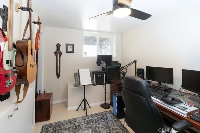 a view of a workspace with furniture