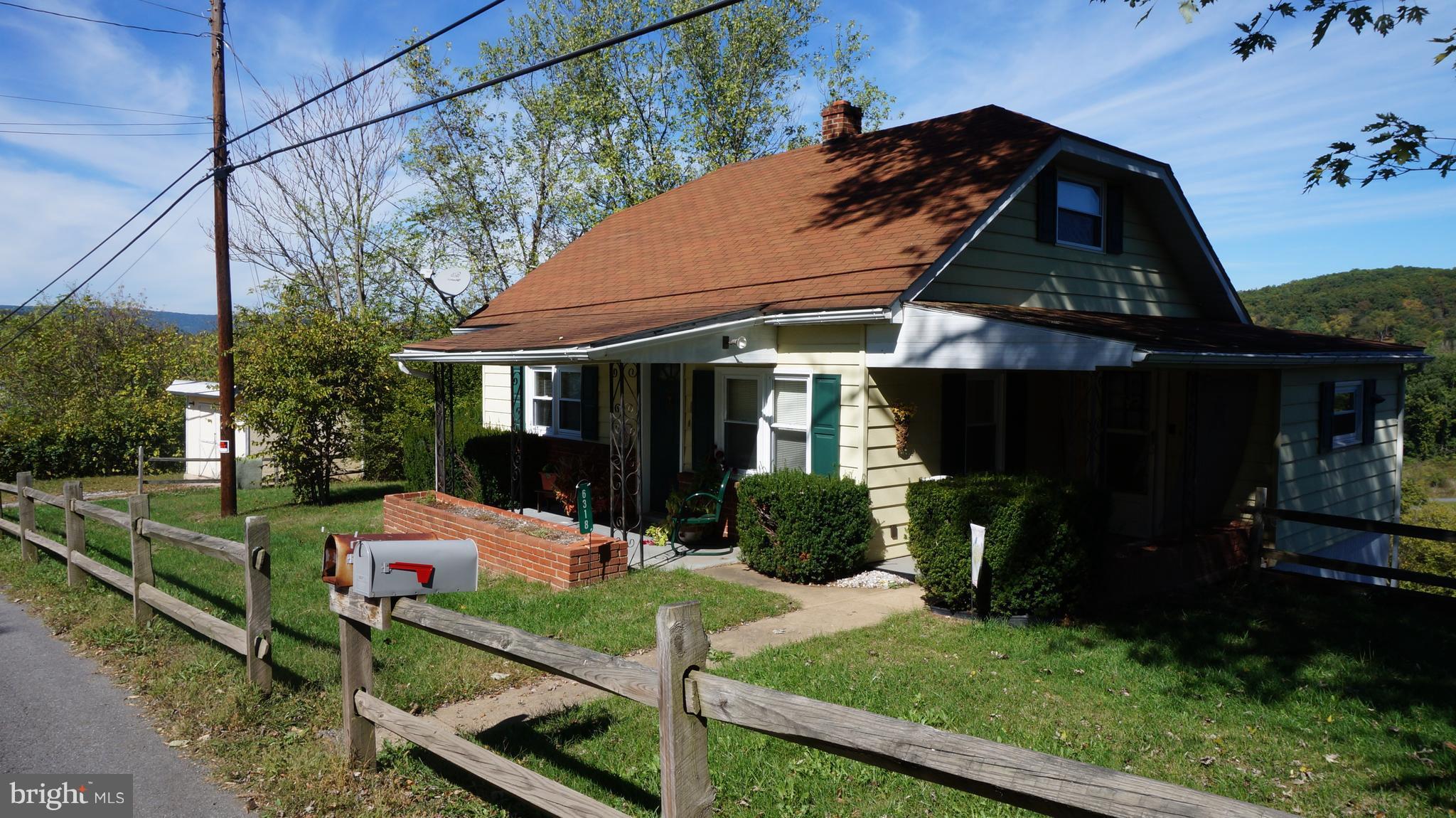 6318 Pious Ridge Road Berkeley Springs, WV 25411 - Photo 1 of 29 Exterior (Front)