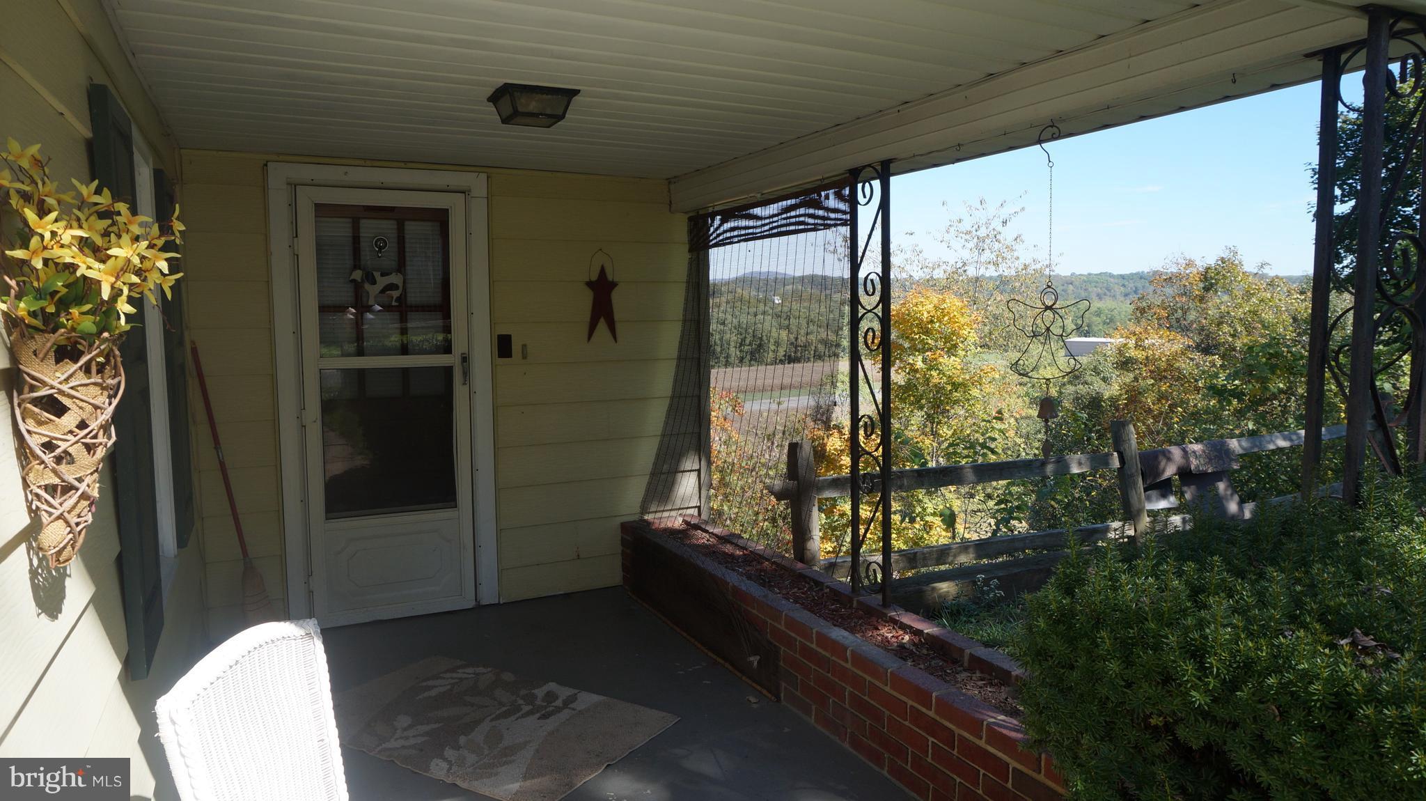 6318 Pious Ridge Road Berkeley Springs, WV 25411 - Photo 2 of 29 Exterior (Front)