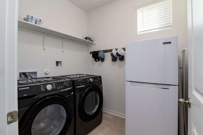 170 Corral Cove Kyle, TX 78640 - Photo 14 of 25 a utility room with dryer and washer