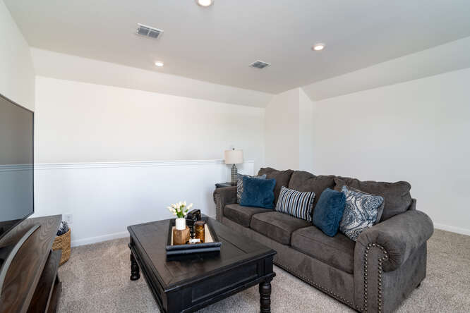 170 Corral Cove Kyle, TX 78640 - Photo 18 of 25 a living room with furniture