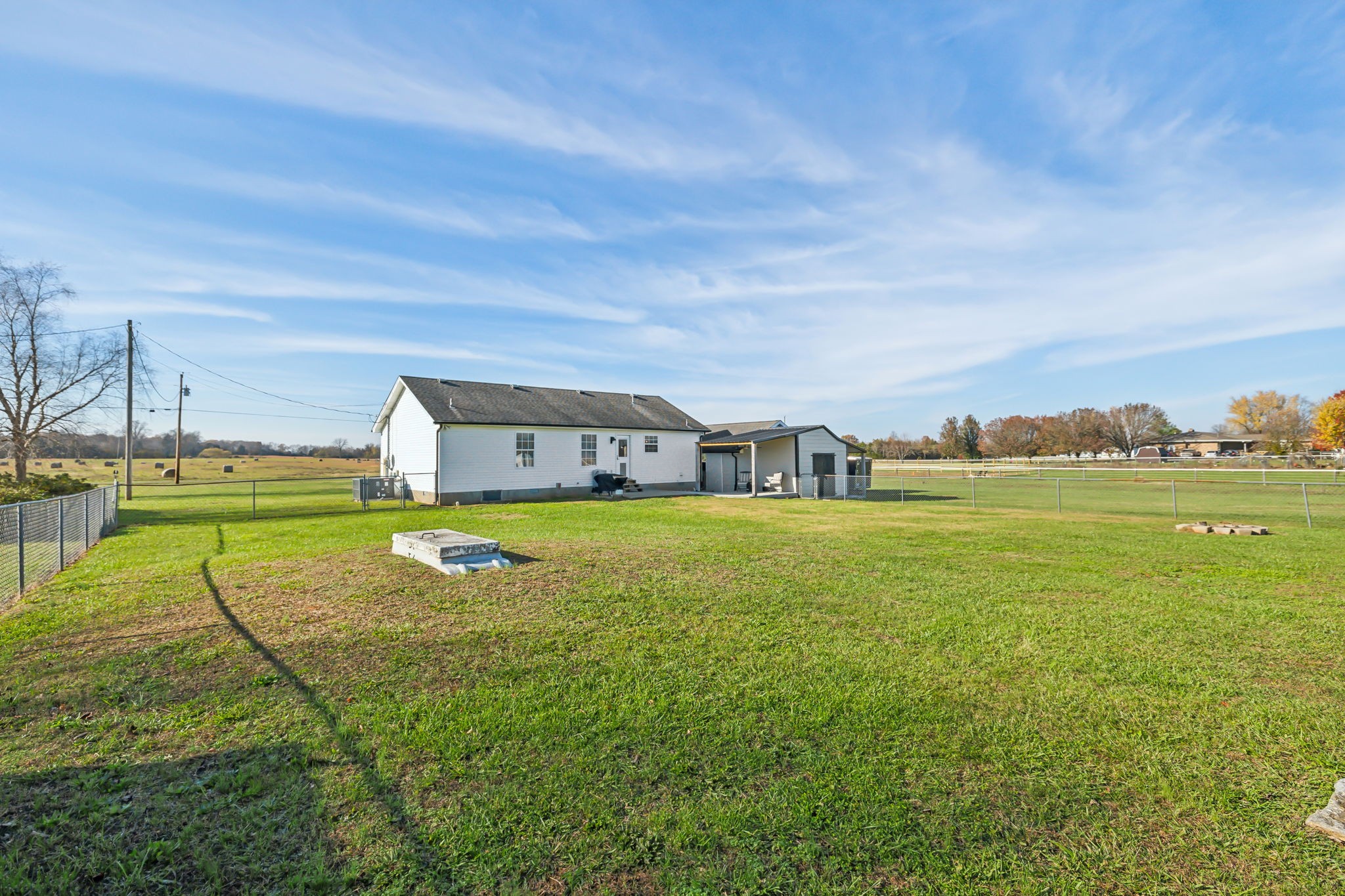 1055 Anderton Road Bell Buckle, TN 37020 - Photo 30 of 51 a view of a house with a big yard