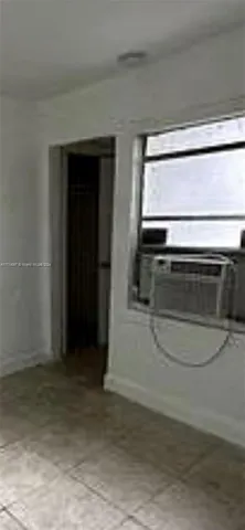 a utility room with washer and dryer