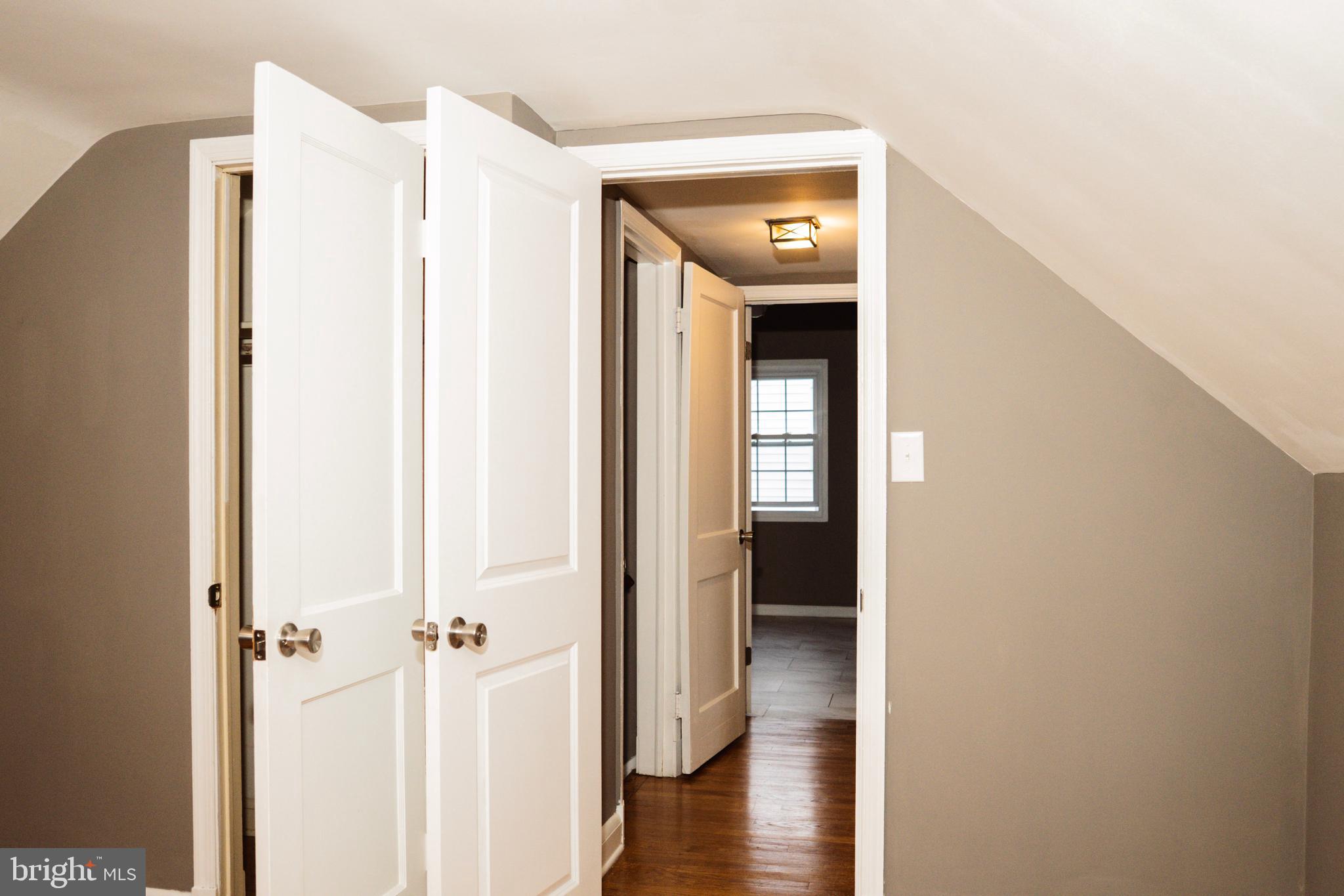 3402 Mayfair Road Baltimore, MD 21207 - Photo 26 of 48 a view of a hallway with wooden floor