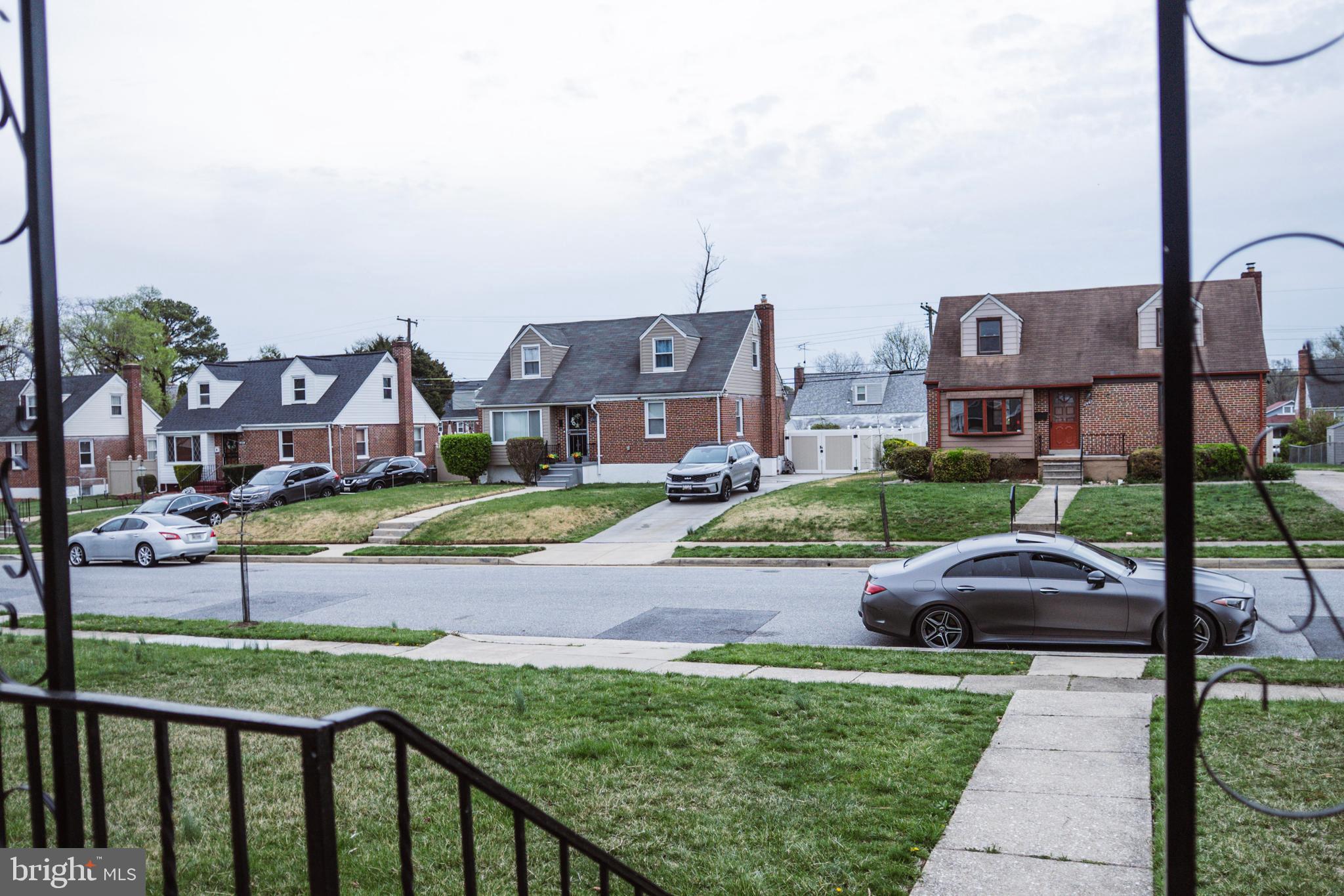 3402 Mayfair Road Baltimore, MD 21207 - Photo 4 of 48 a view of multiple houses with yard