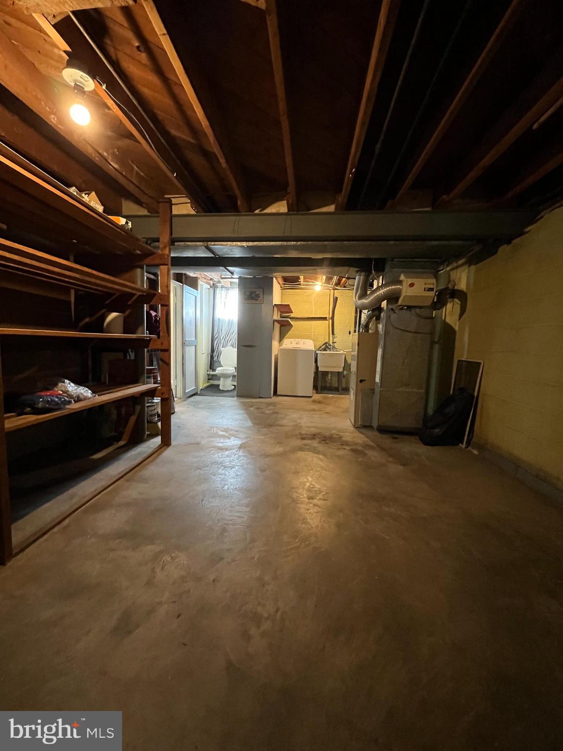 3402 Mayfair Road Baltimore, MD 21207 - Photo 41 of 48 a view of an empty room with wooden walls