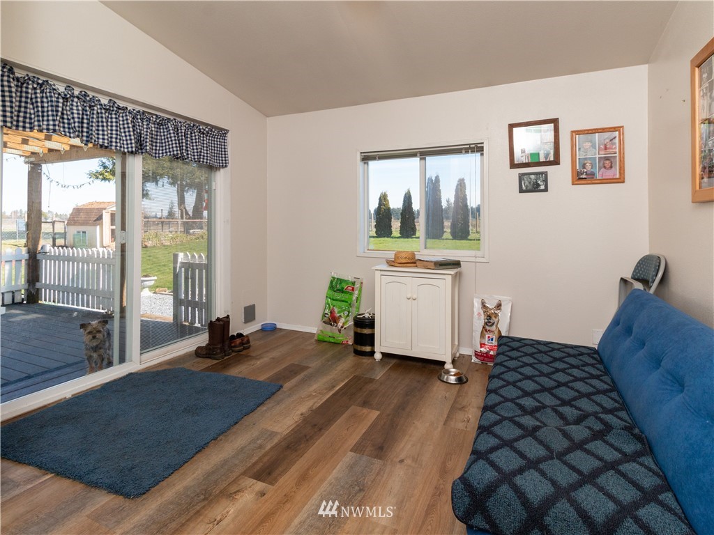 5004 186th Lane Southwest Rochester, WA 98579 - Photo 11 of 27 a bedroom with a bed and a window