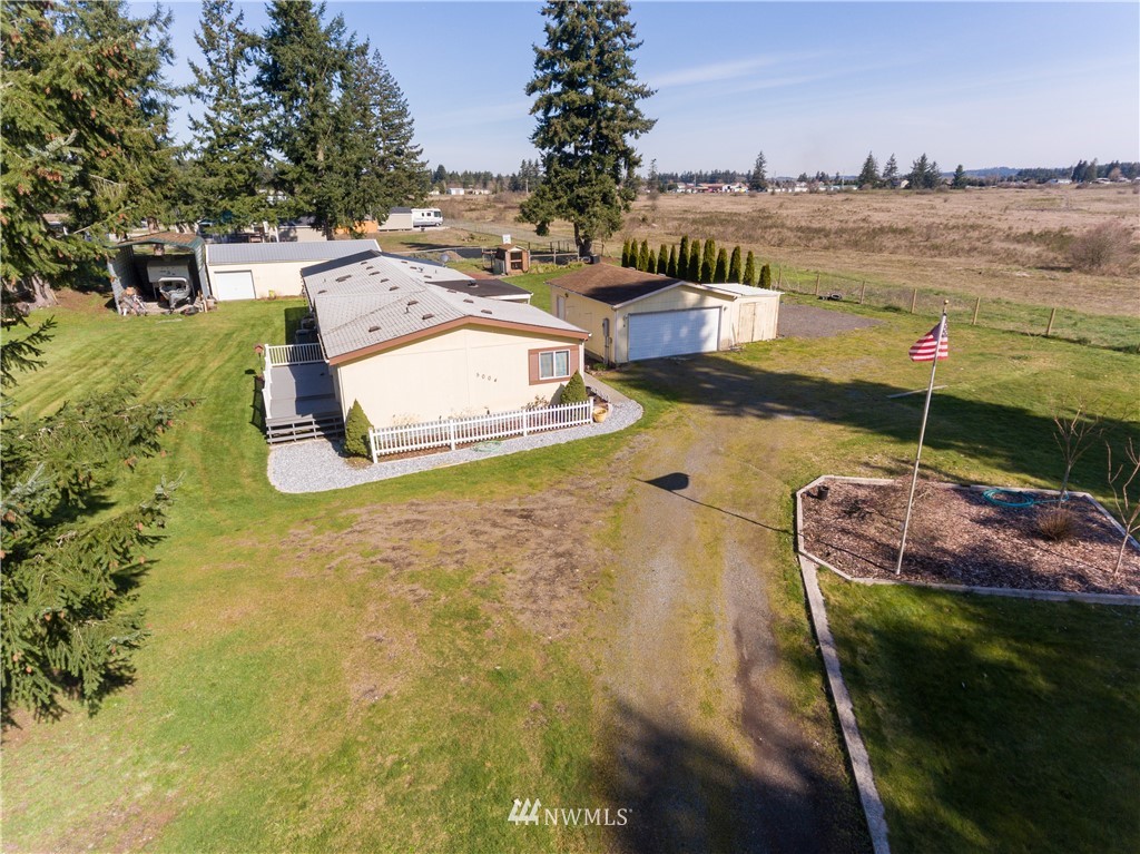 5004 186th Lane Southwest Rochester, WA 98579 - Photo 3 of 27 a view of a swimming pool with an ocean view