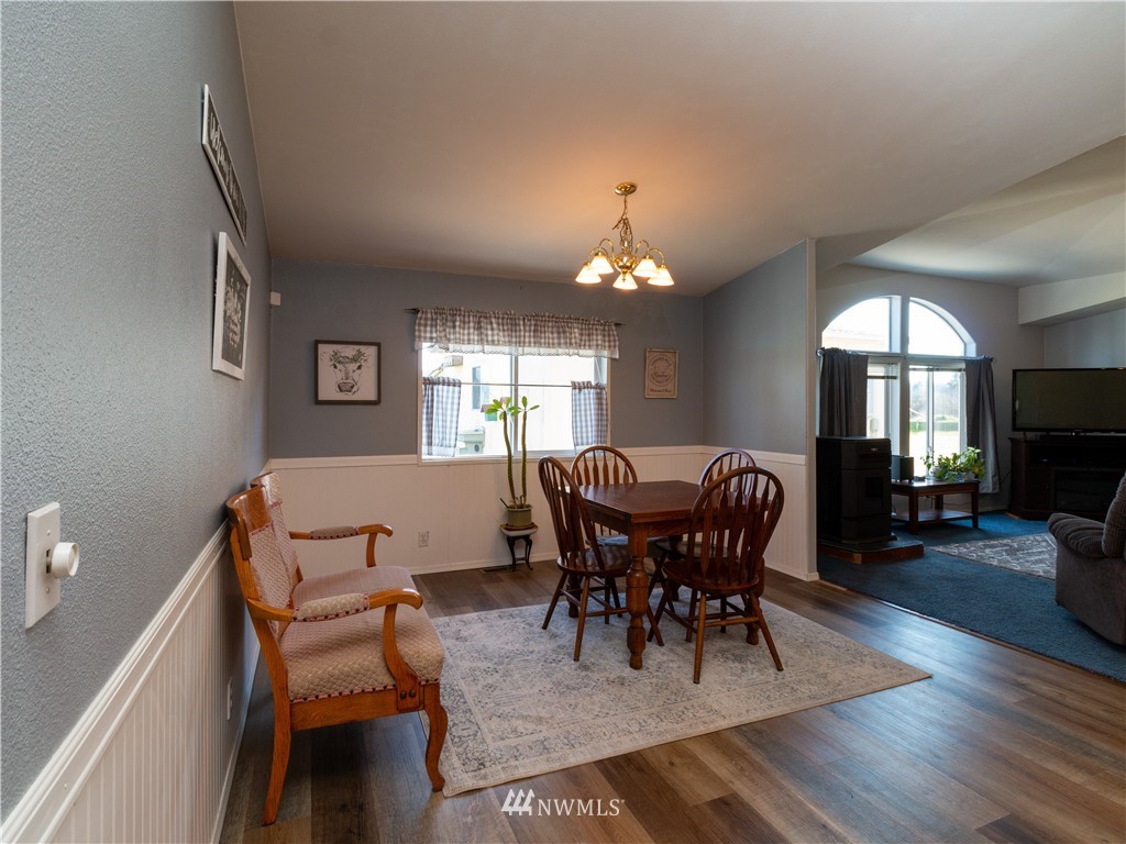 5004 186th Lane Southwest Rochester, WA 98579 - Photo 7 of 27 a dining room with furniture and window