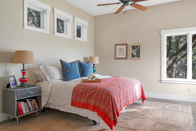 a bedroom with bed and a window