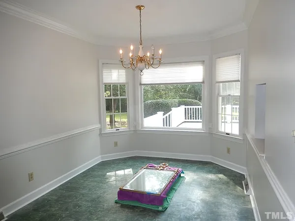 a view of a window and an empty room