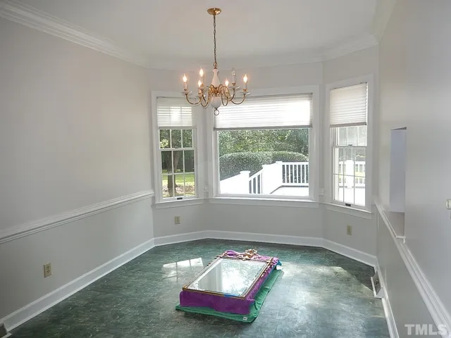 a view of a window and an empty room