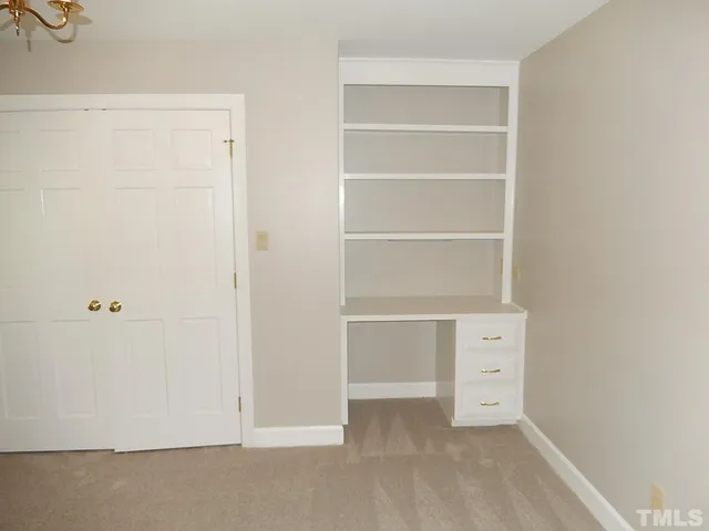 a bathroom with a toilet and a bathtub