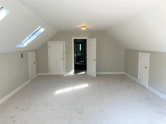 a view of balcony with wooden floor and fence