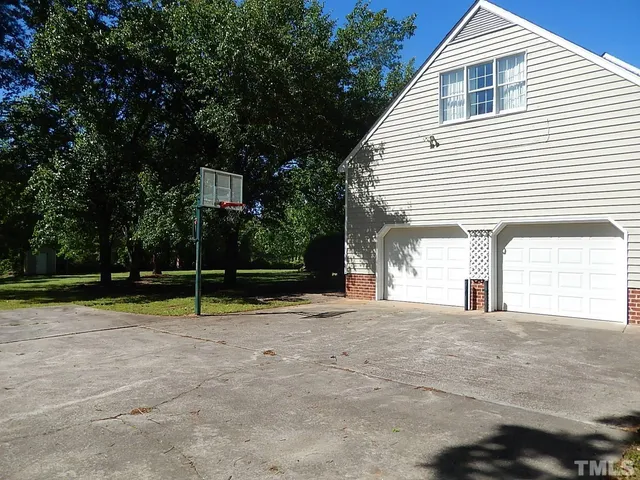 a swimming pool with wooden fence