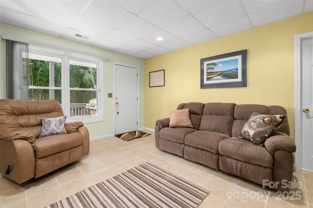 a view of balcony with furniture