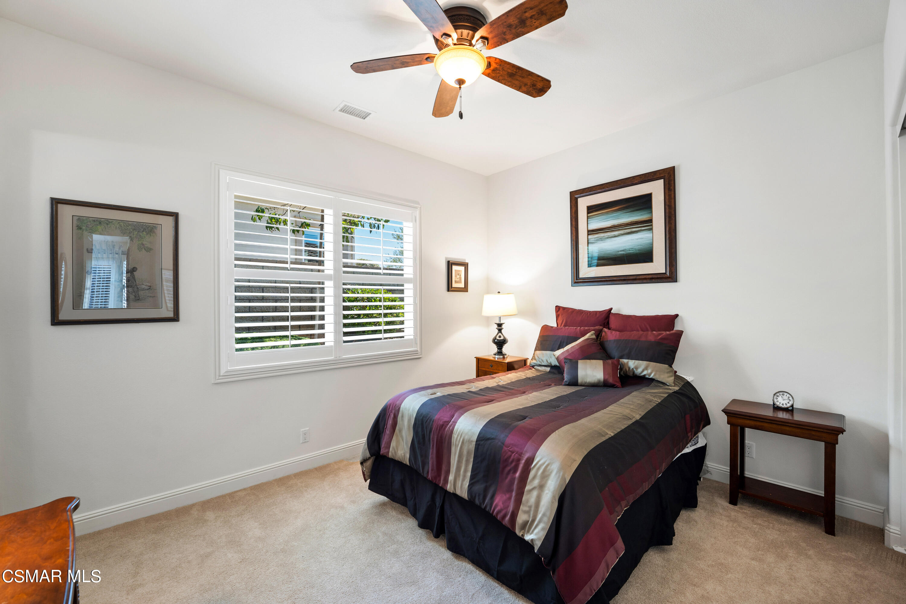 7343 Nicklaus Road Moorpark, CA 93021 - Photo 24 of 42 a bed room with a bed and a window